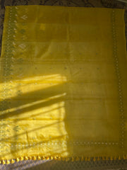Drape detail of beige organza kasuti saree with kasuti embroidery